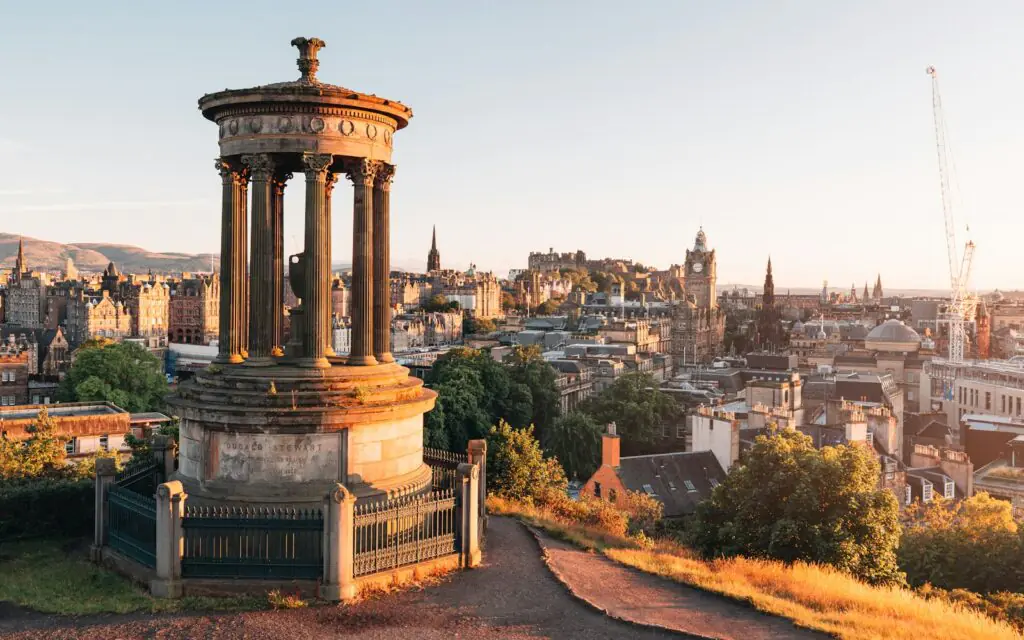 Edinburgh's skyline and castle from Calton Hill with the Dugald Stewart Monument